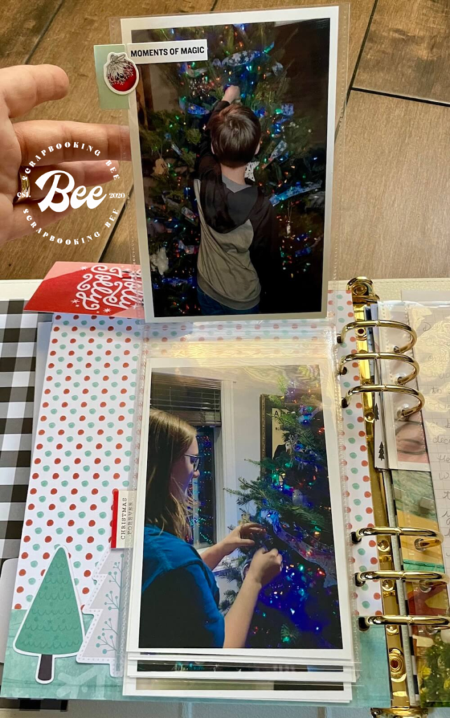 A page in Amanda's 2020 December Daily album with 4x6 flip pages featuring our family decorating our Christmas tree.