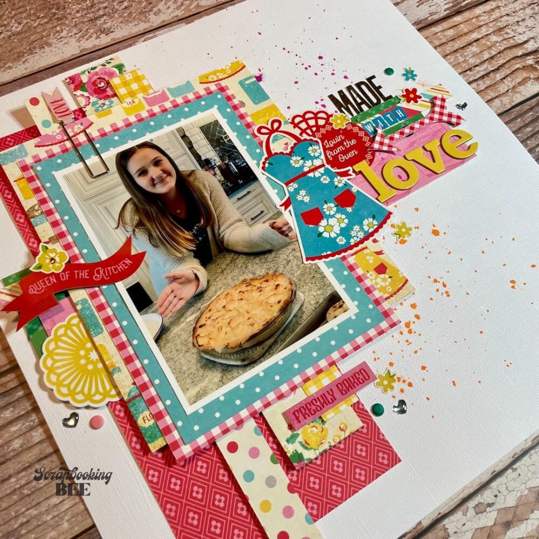 A photo of a scrapbook layout of a girl and the chicken pot pie she made. 