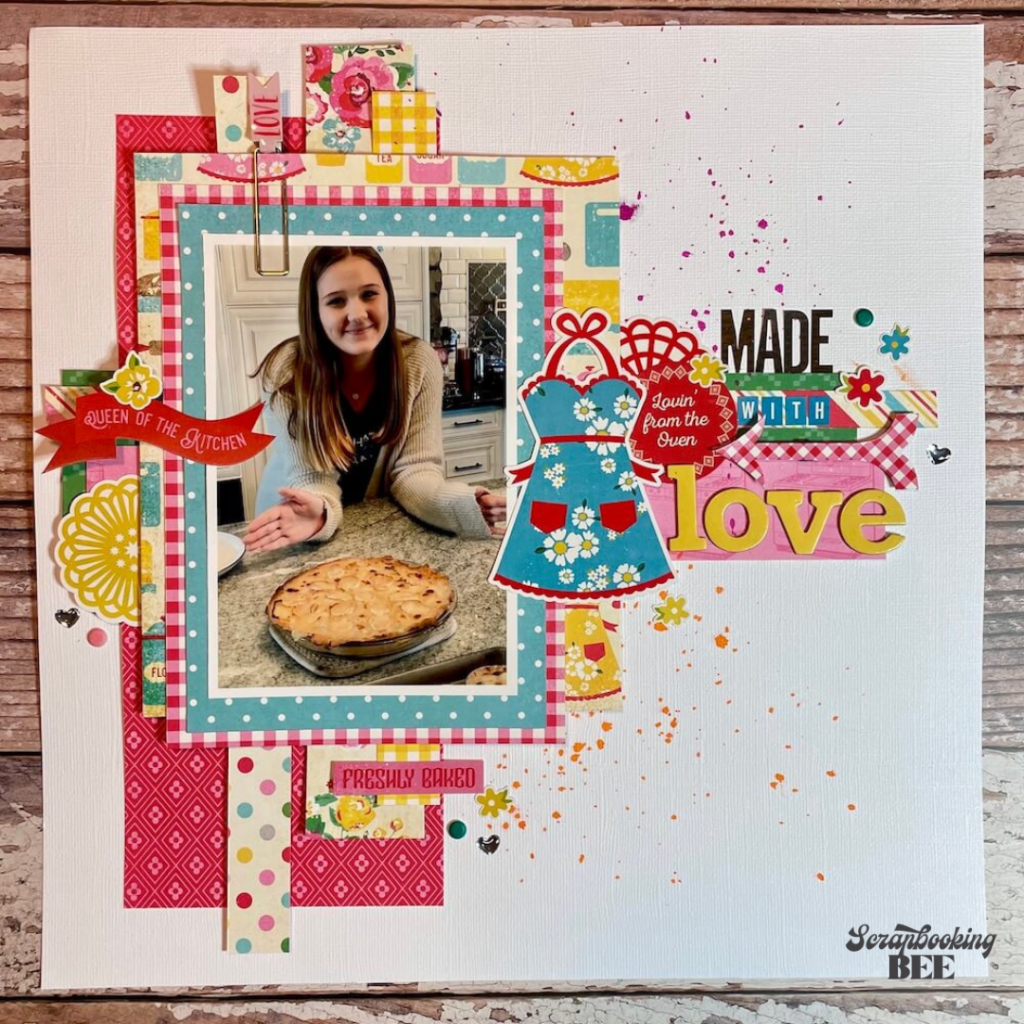 A scrapbook layout featuring a young girl and the meal she cooked.